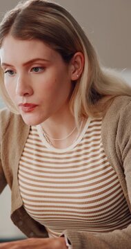 Remote work, notebook and woman with laptop for schedule, appointment booking or agenda in house. Freelancer, virtual assistant and typing for reminder, to do list and research or planning in home