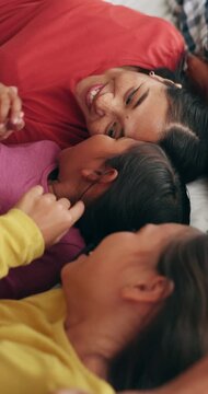 Happy, mother and rest with children in bedroom for love, calm morning and bonding together. Smile, people and laughing with kids for weekend break, family connection and comfortable for wellness