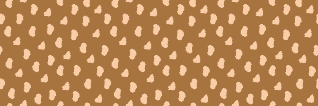 Seamless animal skin pattern with beige spots. Deer print texture. Cute fawn fur background.
