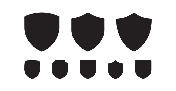 Different shield silhouette shapes set for emblem design heraldry symbols and security branding art.