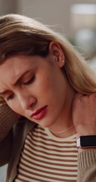 Woman, neck pain and home with stress, discomfort or injury for muscle tension or fibromyalgia. Frustrated, female person or sore spine with joint inflammation, cramp or stiffness for bad posture