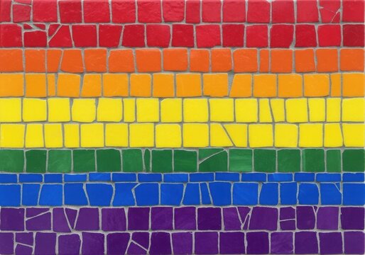 Vibrant rainbow colored mosaic tile wall with red, orange, yellow, green, blue, and purple hues