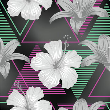 Floral seamless pattern with leaves on colorful triangle pattern background