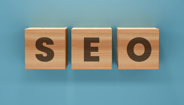 SEO Blocks: A trio of wooden blocks displaying the letters SEO sit against a vibrant blue backdrop, creating a simple yet striking visual. 