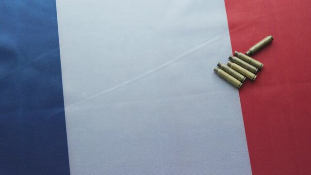 Spent Bullet Casings on France Flag Close-up