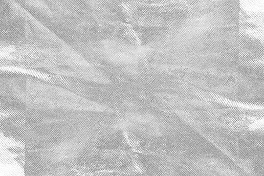 Destroyed Grey Nonwoven Spunbond Fabric with Peeling Distressed Grunge Texture Overlay - The Rugged Texture Offers a Strong Visual Aesthetic, Suitable for Fashion Design and Creative Projects.