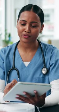 Hospital, consulting and nurse on tablet in office for appointment, advice and research for treatment. Healthcare, clinic and woman on tech for medical service, digital report and patient diagnosis
