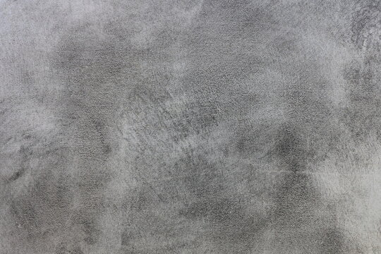 Soft gray texture with  brushstrokes on grunge metal background