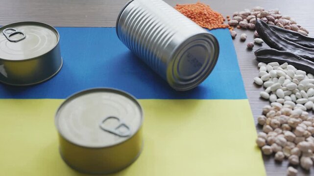 Canned Foods on Ukrainian National Flag Close-up
