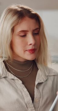 Woman, video call and remote work from home with laptop, discussion and review for freelance job. Person, computer and virtual assistant with online meeting, consulting and happy with talk at house