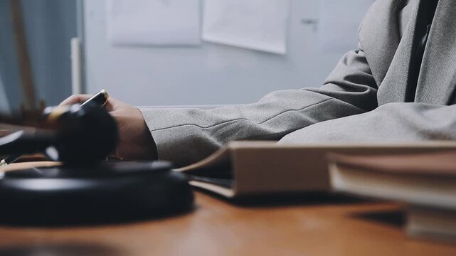 Lawyer explained to the client about the law that must be brought against the court case.