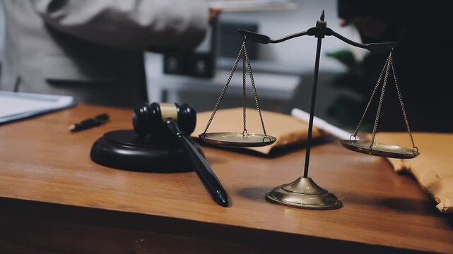 Lawyer explained to the client about the law that must be brought against the court case.