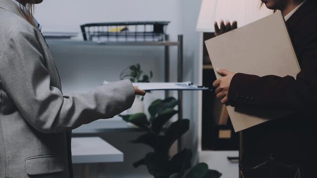 Lawyer explained to the client about the law that must be brought against the court case.