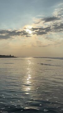 El Pared&oacute;n, Guatemala, is a serene black sand beach with crashing Pacific waves, palm trees, surfers, and breathtaking golden sunsets.