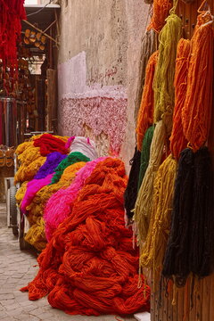Colorful-dyed (ochre-red-purple-pink-green-orange-beige-black-brown) skeins in the Souk des Teinturiers (dyers) in the Medina. Marrakesh-Morocco-318
