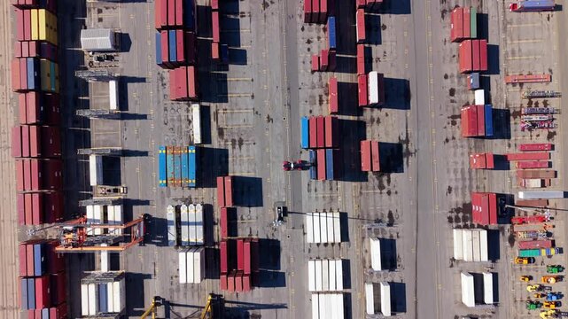 Aerial Container Terminal Halifax Nova Scotia Canada With Cranes And Trucks Loading And Unloading Cargo Ships Daytime Logistics Global Trade Supply Chain Maritime Transport 4K 
