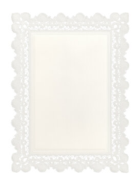 Vintage white lace border frame with blank paper center on black background. Ornate crochet doily style rectangle with empty copy space for invitation, wedding card, menu or photo placeholder.