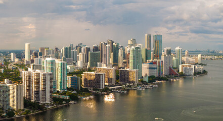Fototapeta premium Miami, coastal city in Florida. Waterfront skyscraper buildings in downtown district of USA urban area. American megapolis with business financial district