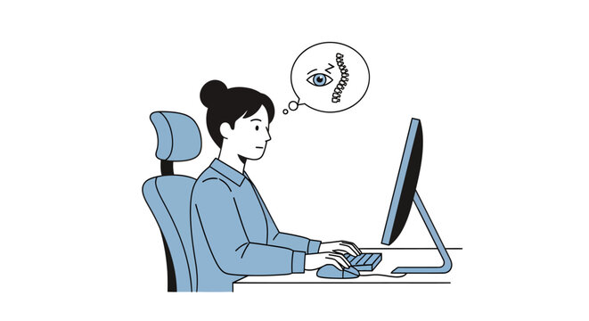 woman sitting at desk working on computer with frustrated expression