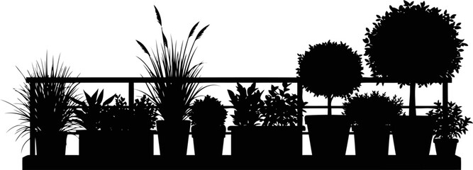 Fototapeta premium Row of various potted plants on a balcony railing silhouette