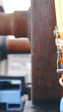 Wheelbase cargo tied up with thick belt close-up dolly slide over