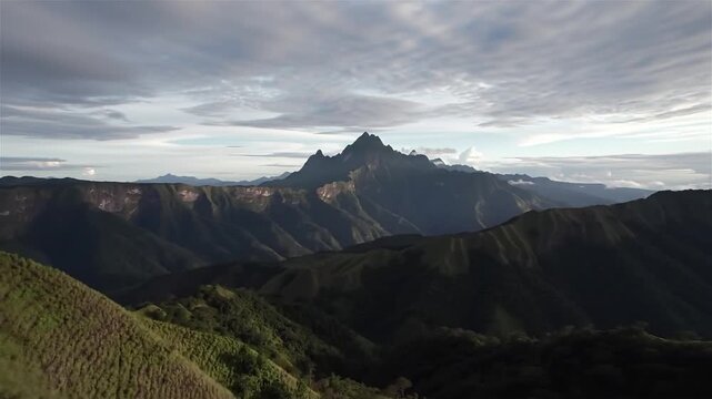 Dramatic landscape of mountains and valleys, The Baliem Valley is a high mountain valley of mountain Trikora Crest in western New Guinea, Indonesia.