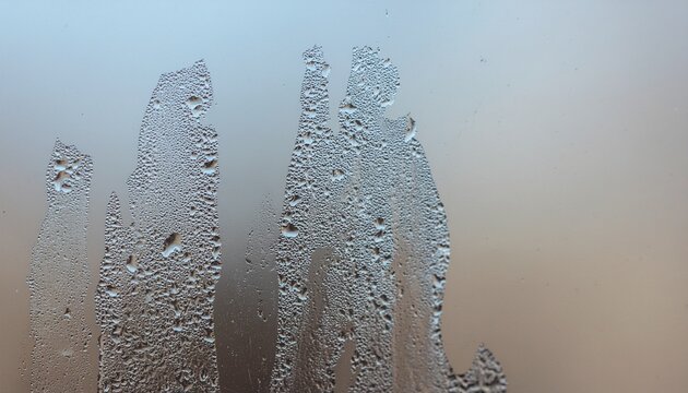 Dried Water Residue on Glass Surface Showing Natural Evaporation Process