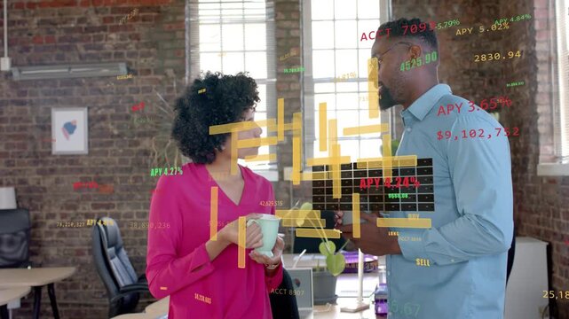 Woman sipping mug while man explaining, causing animated financial charts over scene for APY review