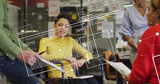 Listening seated woman in yellow top taking notes in notebook at office meeting, with HUD overlays