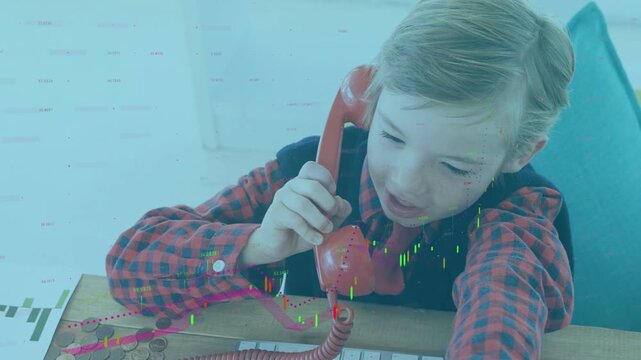 Boy lifting red handset, making pretend call while reaching keys and coins, tech overlays growing