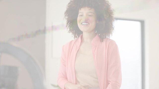 Content creator waving at smartphone, phone recording, engaging audience, ringlight, gesturing
