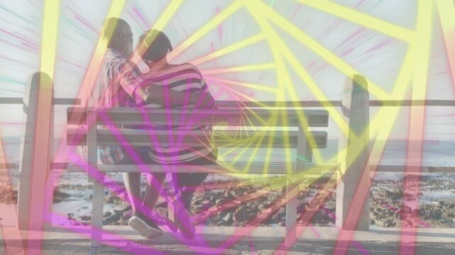 Seniors on bench man embracing partner for comfort leaning, neon spiral pulsing across frame health