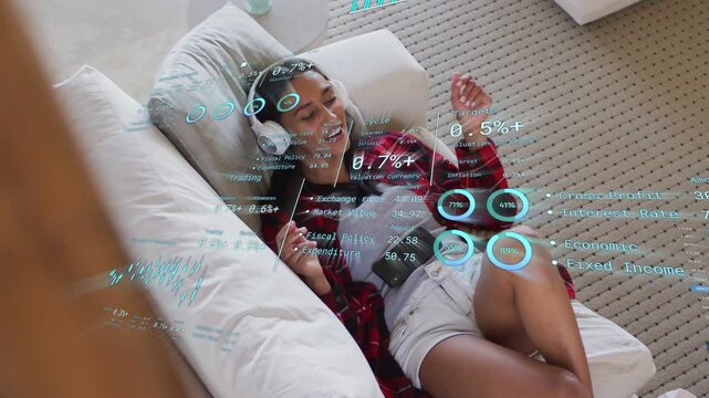 Woman reclining on sofa, opening eyes and tapping phone, interacting with holographic tech charts