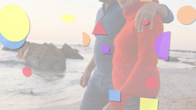 Retired duo walking shoreline soaking sun camera pulling back revealing faces with shapes travel