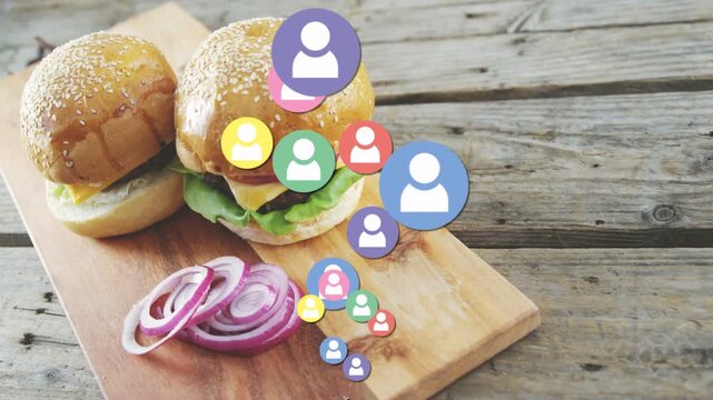 First avatar popping at board edge starting avatars rising and grouping over burgers showing likes