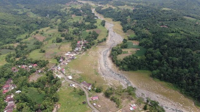 Agam, Indonesia - April 3rd 2026: Aerial Bird's Eye View of Lush Natural Landscape and Plantations Surrounding Salareh Aia Timur: Top-Down Perspective of Rural Tropical Environment