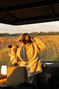Family experiencing a mobile safari, Okavango Delta, Botswana, Africa