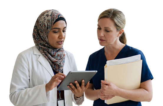 Female doctor and nurse discussing digital patient records on tablet isolated on white or transparent background
