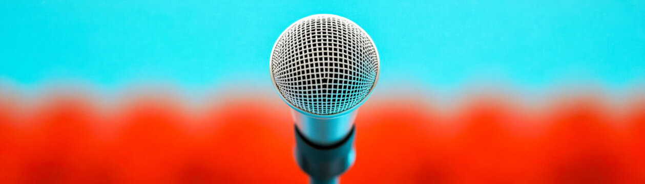 Community forum with a speaker addressing discrimination and promoting inclusive social justice reform