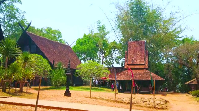The garden and houses on grounds of Baan Dam (Black House), Chiang Rai, Thailand