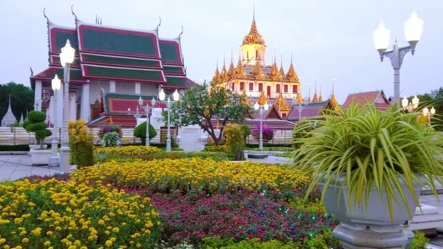 The flower beds in front of Loha Prasat of Wat Ratchanatdaram, Bangkok, Thailand