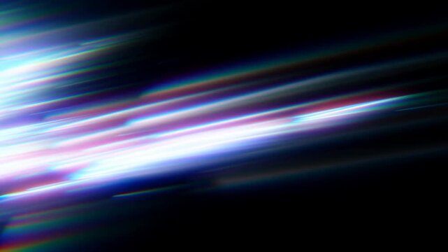 Tracking shot of neon light streaks racing across dark background with chromatic glint and directional motion blur in studio environment