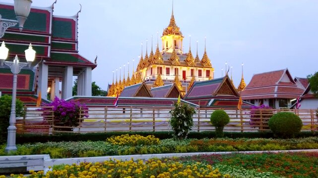 Loha Prasat of Wat Ratchanatdaram in evening lights, Bangkok, Thailand