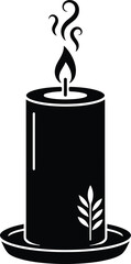 Obraz premium Black candle with leaf design burning on plate for decoration or ambiance