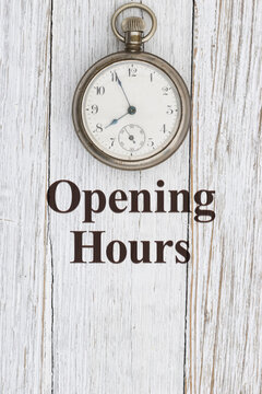 Opening hours vintage pocket watch time concept