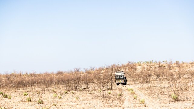 safari vehicle on mobile safari in the Makgadikgadi Park, Botswana, Africa