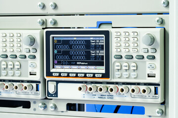 Fototapeta premium Digital control panel displays numerical values and settings. Screen shows step counts, position, and speed controls. Interface features buttons, dials