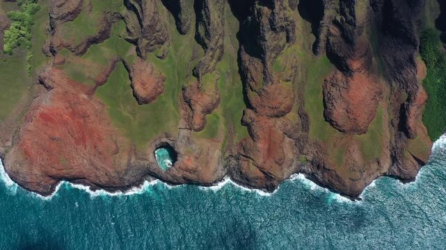 Stunning aerial Na Pali coastline dramatic cliffs turquoise ocean, 4K