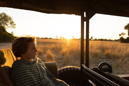 Family on mobile safari, Okavango Delta, Botswana, Africa