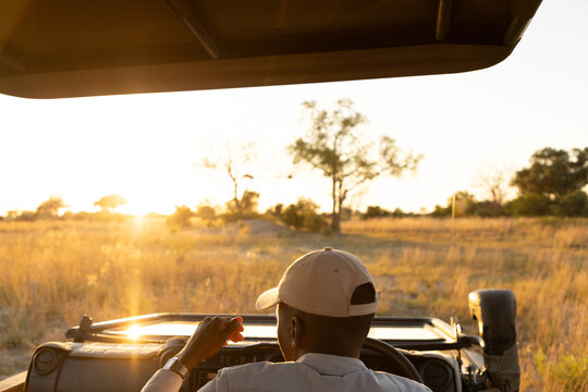 Family on mobile safari, Okavango Delta, Botswana, Africa